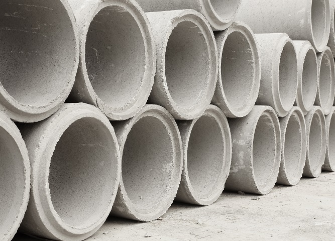 stacked of concrete drainage pipes for construction industrial.